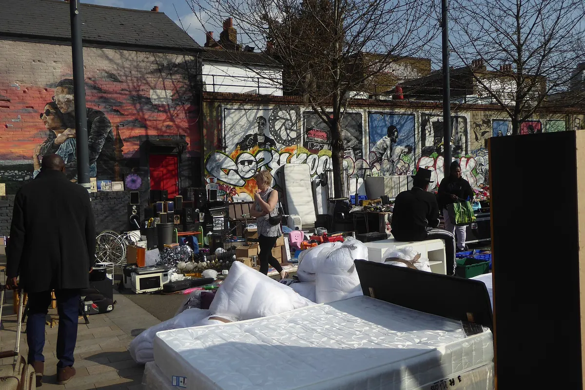 Second-hand stalls and murals at Deptford Market Yard